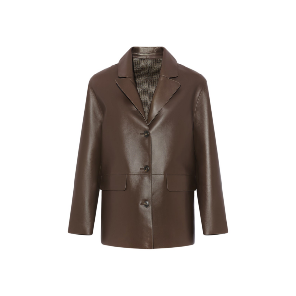 Woman wearing Yves Salomon shearling fur coat – luxury outerwear at Coveti