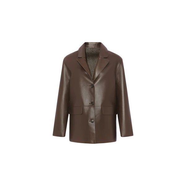 Woman wearing Yves Salomon shearling fur coat – luxury outerwear at Coveti