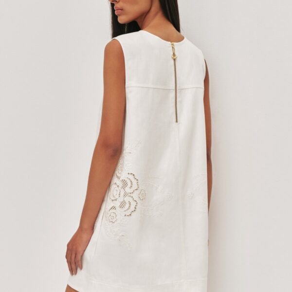 Aje Aus Dresses – structured silhouette with raw femininity from Coveti