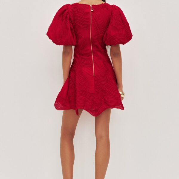 Aje Aus Dresses – structured silhouette with raw femininity from Coveti