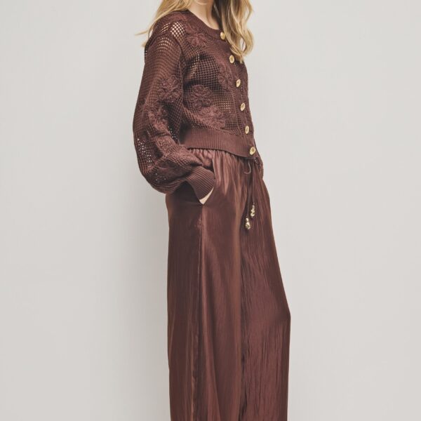 Aje Aus  – structured silhouette with raw femininity from Coveti