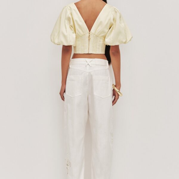 Aje clothing Aus Pants – structured silhouette with raw femininity from Coveti