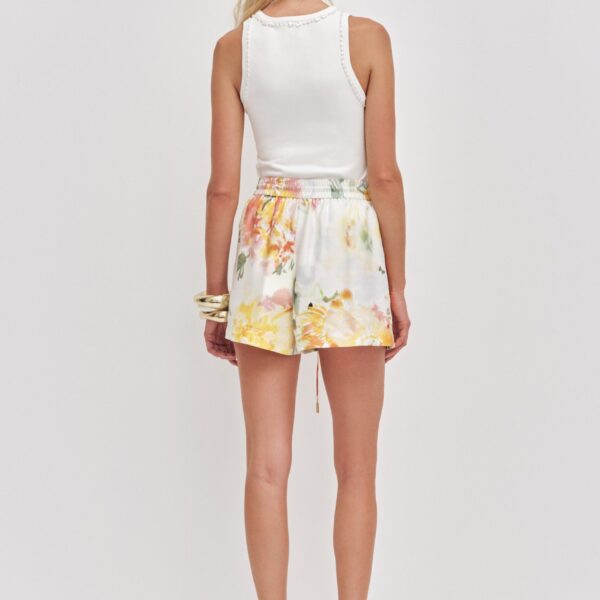 Aje clothing Aus Shorts – structured silhouette with raw femininity from Coveti