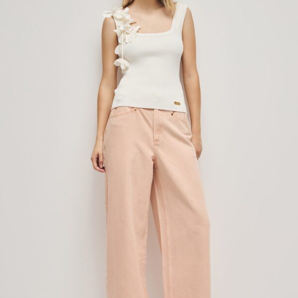 Aje Aus  – structured silhouette with raw femininity from Coveti