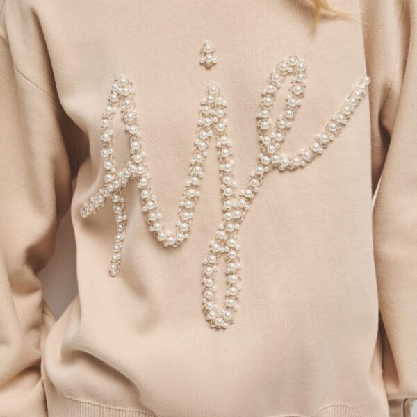 Aje Aus  – structured silhouette with raw femininity from Coveti