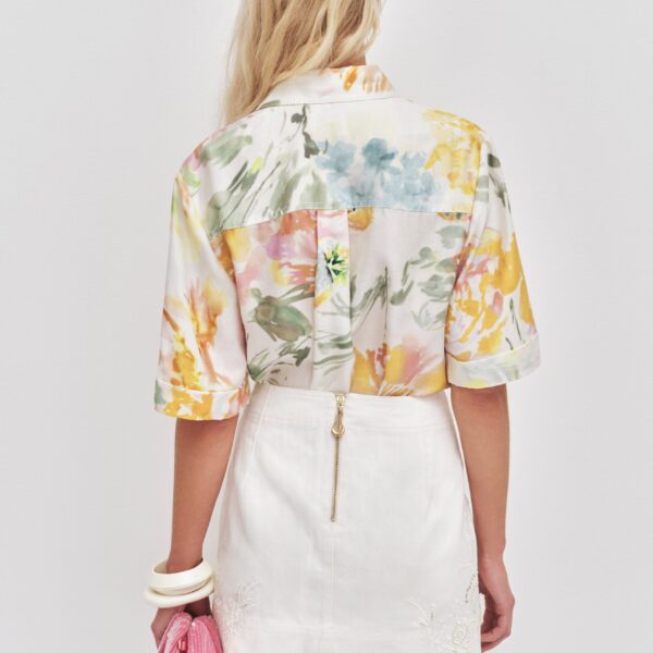 Aje Aus Tops – structured silhouette with raw femininity from Coveti
