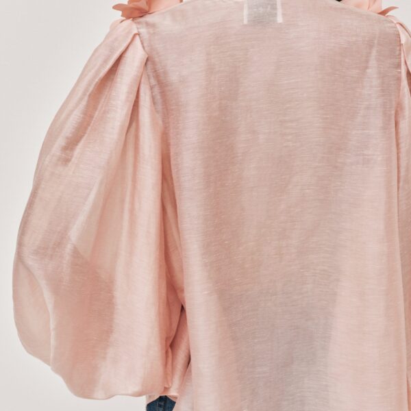 Aje Aus Tops – structured silhouette with raw femininity from Coveti