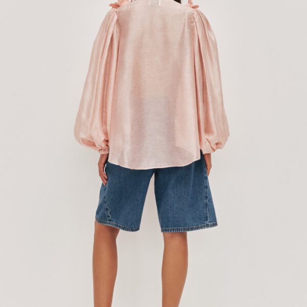 Aje clothing Aus Tops – structured silhouette with raw femininity from Coveti