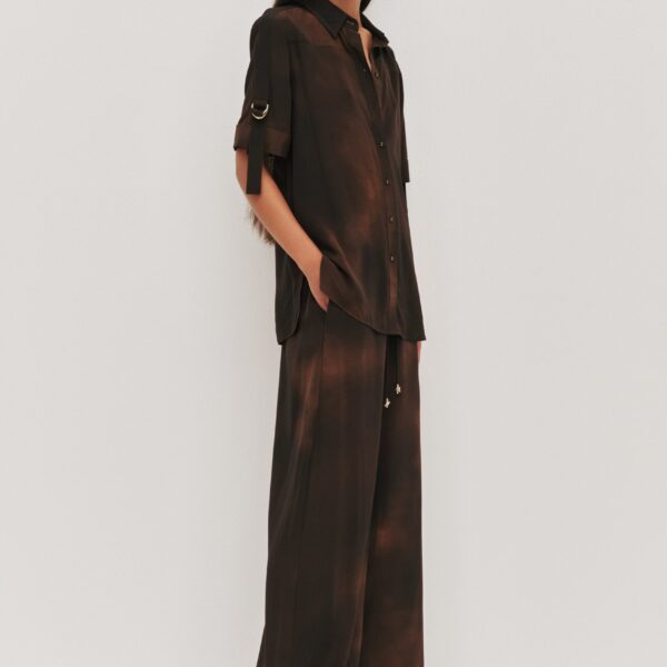 Aje Aus Tops – structured silhouette with raw femininity from Coveti