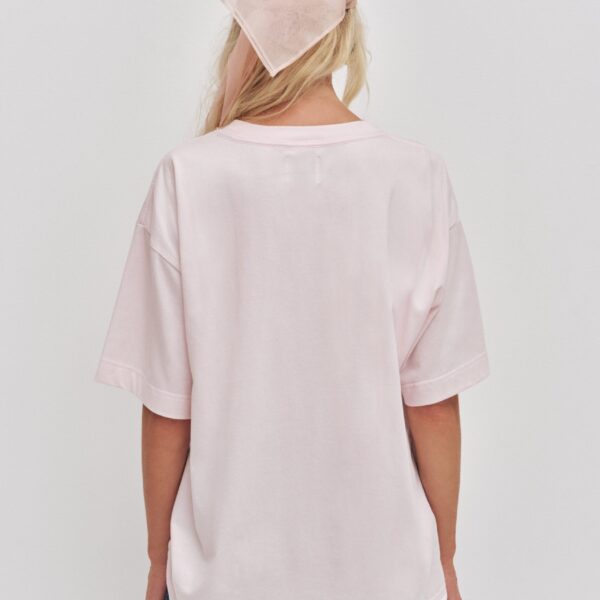 Aje Aus Tops – structured silhouette with raw femininity from Coveti