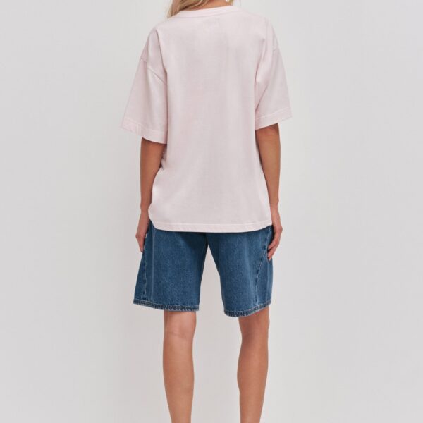 Aje clothing Aus Tops – structured silhouette with raw femininity from Coveti