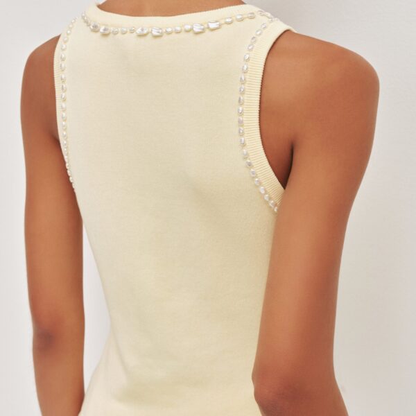 Aje clothing Aus Tops – structured silhouette with raw femininity from Coveti