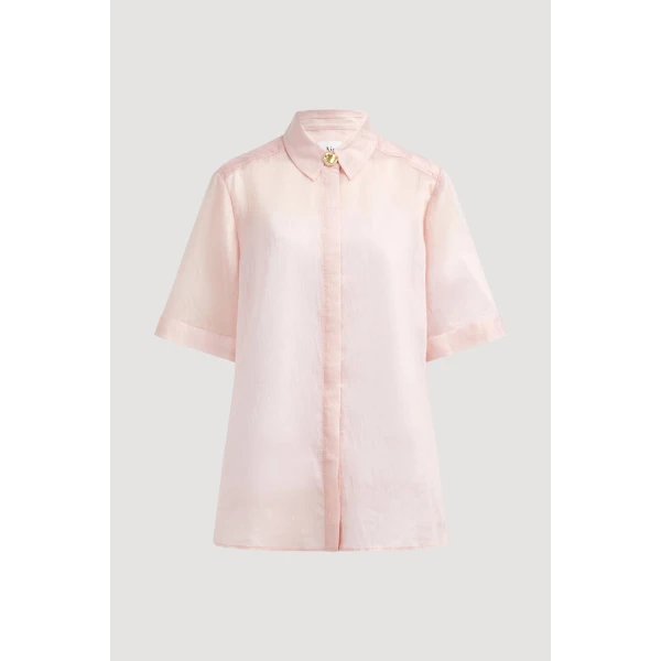 Aje clothing Aus Tops – structured silhouette with raw femininity from Coveti