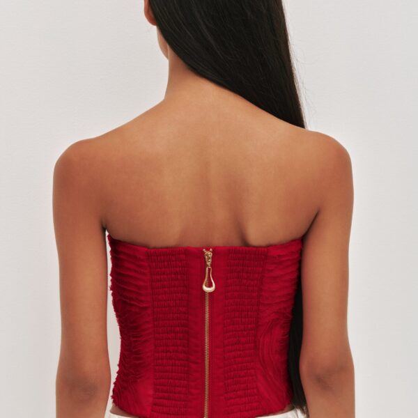 Aje Aus Tops – structured silhouette with raw femininity from Coveti