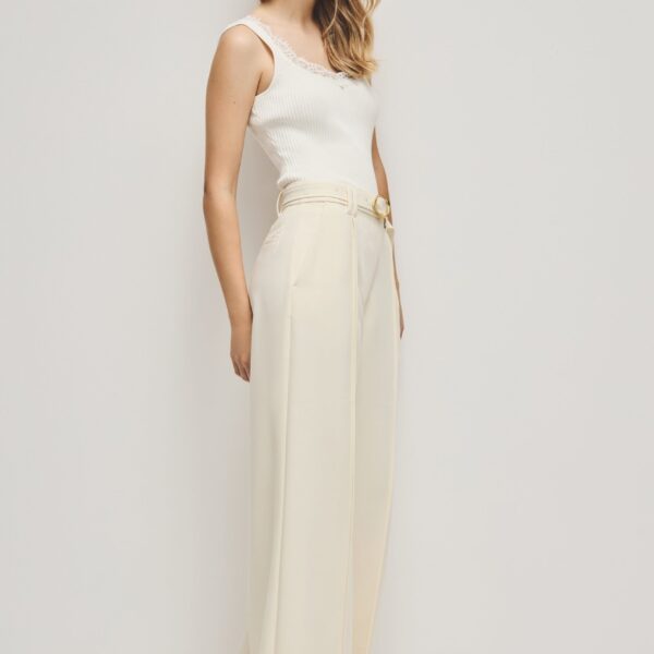 Aje Aus  – structured silhouette with raw femininity from Coveti
