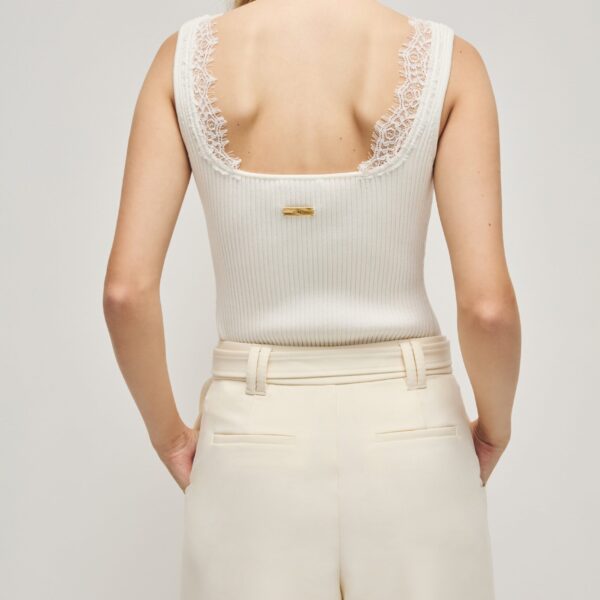 Aje clothing Aus  – structured silhouette with raw femininity from Coveti