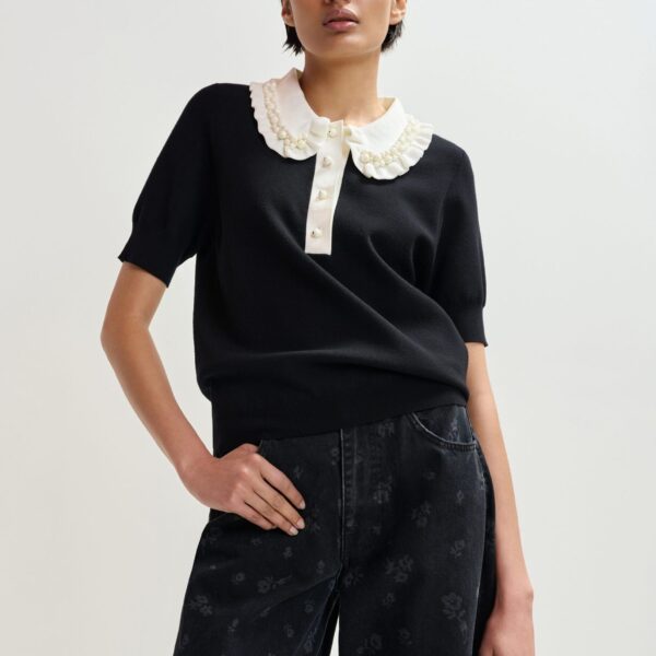 Essentiel Antwerp Black and off-white ruffle fine-knit polo top with bead embellishments - Essentiel Antwerp Tops - Colorful Belgian Design - Shop at Coveti