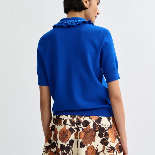 Essentiel Antwerp Blue ruffle fine-knit polo top with bead embellishments - Essentiel Antwerp Tops - Colorful Belgian Design - Shop at Coveti
