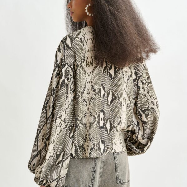 beige and black top with puffed sleeves and snake print - Essentiel Antwerp Tops - Colorful Belgian Design - Shop at Coveti