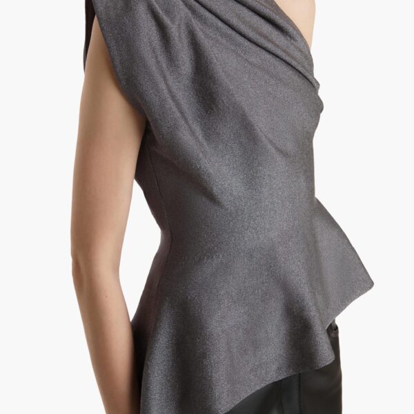 Elevate your elegance in this Khaite Tops   from the 2025 resort wear edit