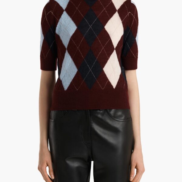 Elevate your elegance in this Khaite Tops   from the 2025 resort wear edit