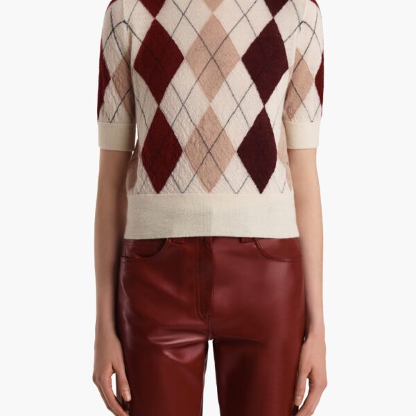 Elevate your elegance in this Khaite Tops   from the 2025 resort wear edit