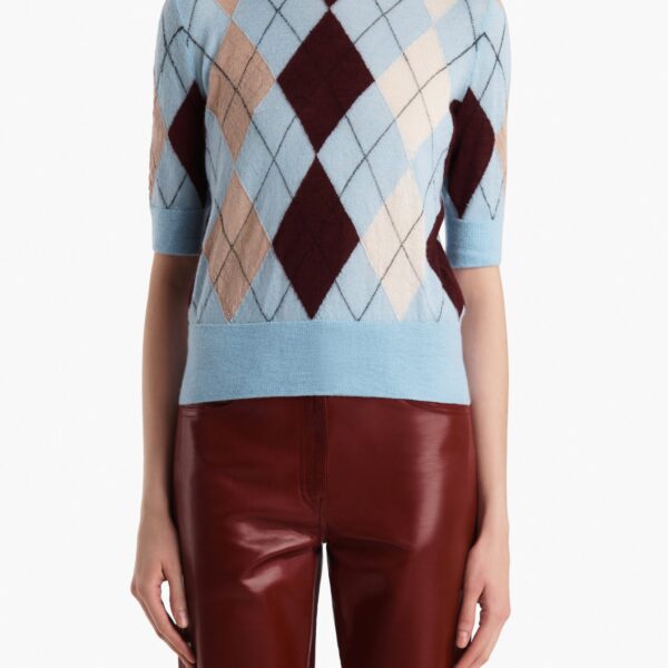 Elevate your elegance in this Khaite Tops   from the 2025 resort wear edit
