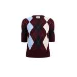 Elevate your elegance in this Khaite Tops   from the 2025 resort wear edit