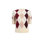 Elevate your elegance in this Khaite Tops   from the 2025 resort wear edit