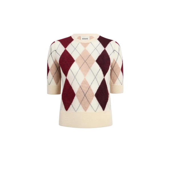 Elevate your elegance in this Khaite Tops   from the 2025 resort wear edit