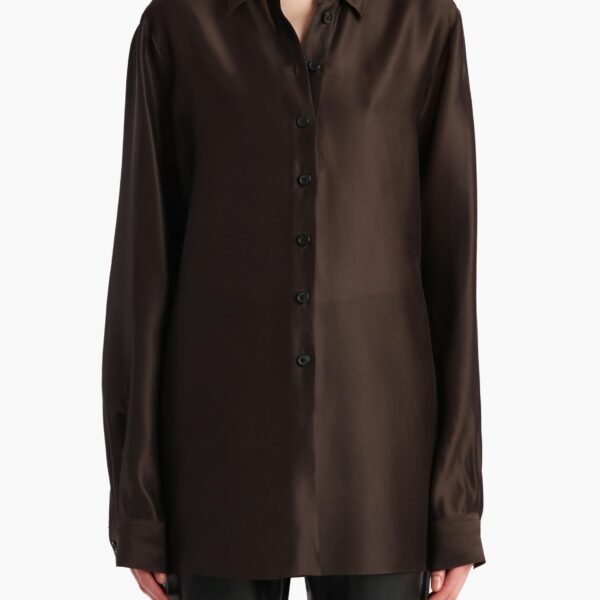 Elevate your elegance in this Khaite Tops   from the 2025 resort wear edit