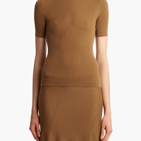 Elevate your elegance in this Khaite Tops   from the 2025 resort wear edit