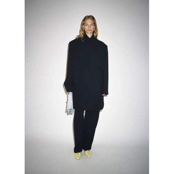 Elevate your elegance in this Khaite Coats   from the 2025 resort wear edit