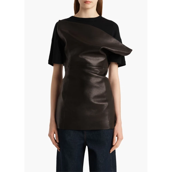 Elevate your elegance in this Khaite Tops   from the 2025 resort wear edit