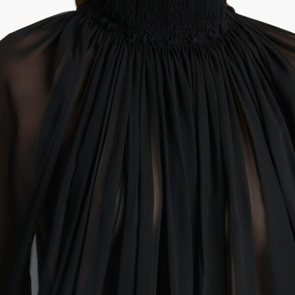 Elevate your elegance in this Khaite Tops   from the 2025 resort wear edit