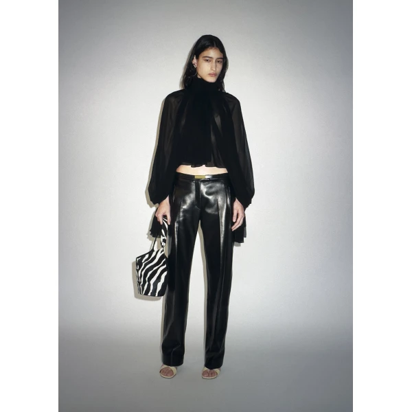 Elevate your elegance in this Khaite Tops   from the 2025 resort wear edit