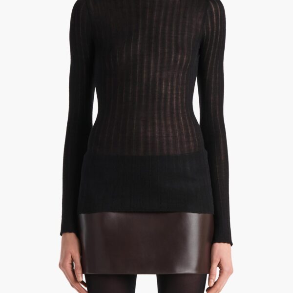 Elevate your elegance in this Khaite Tops   from the 2025 resort wear edit