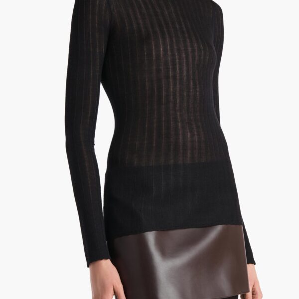 Elevate your elegance in this Khaite Tops   from the 2025 resort wear edit
