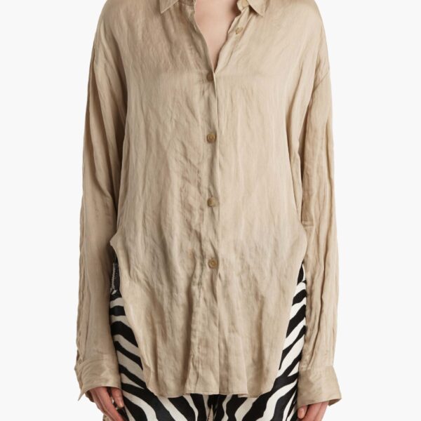 Elevate your elegance in this Khaite Tops   from the 2025 resort wear edit