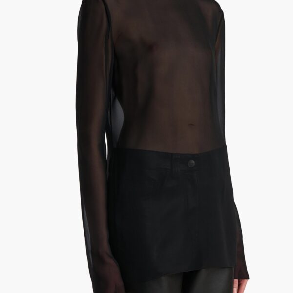 Elevate your elegance in this Khaite Tops   from the 2025 resort wear edit