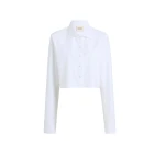Elevate your elegance in this Khaite Tops   from the 2025 resort wear edit