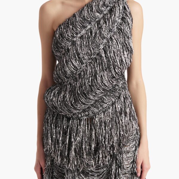 Elevate your elegance in this Khaite Tops   from the 2025 resort wear edit