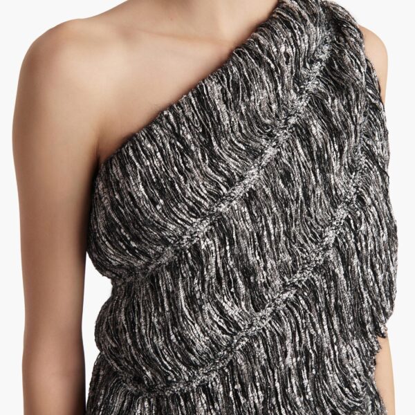 Elevate your elegance in this Khaite Tops   from the 2025 resort wear edit