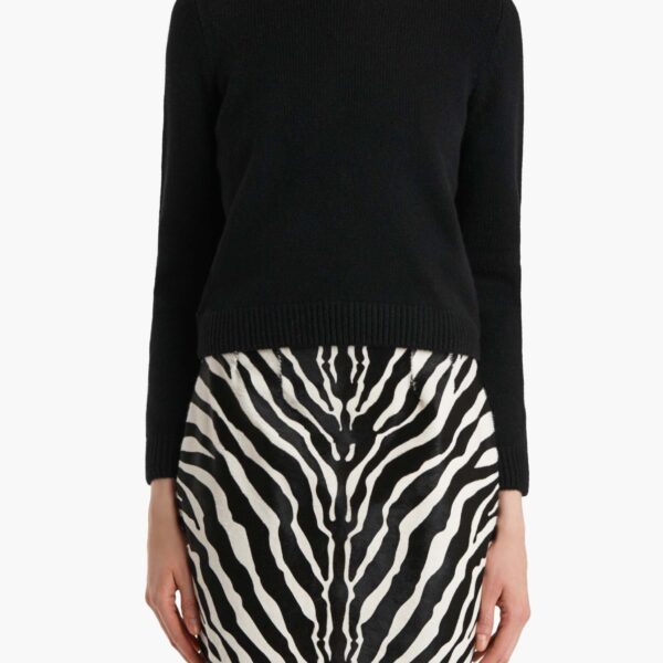 Elevate your elegance in this Khaite Knitwear   from the 2025 resort wear edit