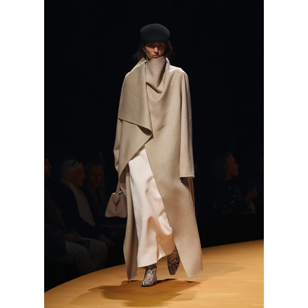 Elevate your elegance in this Khaite Coats   from the 2025 resort wear edit