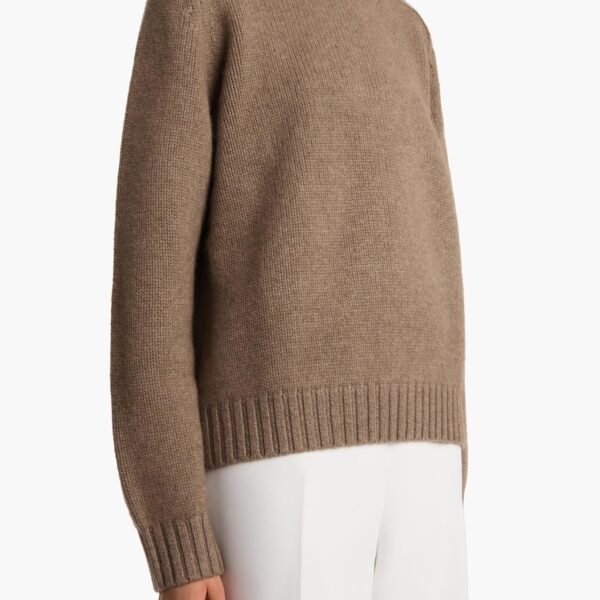 Elevate your elegance in this Khaite Knitwear   from the 2025 resort wear edit