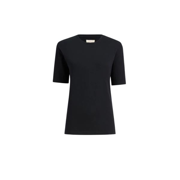 Elevate your elegance in this Khaite Tops   from the 2025 resort wear edit
