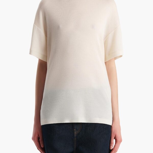 Elevate your elegance in this Khaite Tops   from the 2025 resort wear edit
