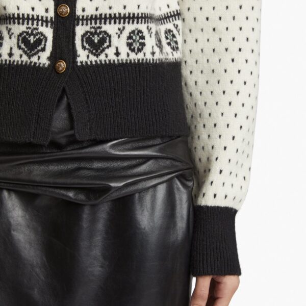 Elevate your elegance in this Khaite Knitwear   from the 2025 resort wear edit