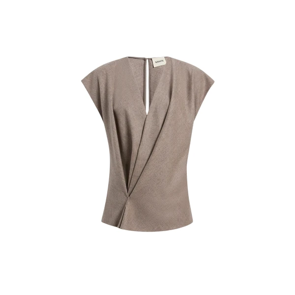 Elevate your elegance in this Khaite Tops   from the 2025 resort wear edit